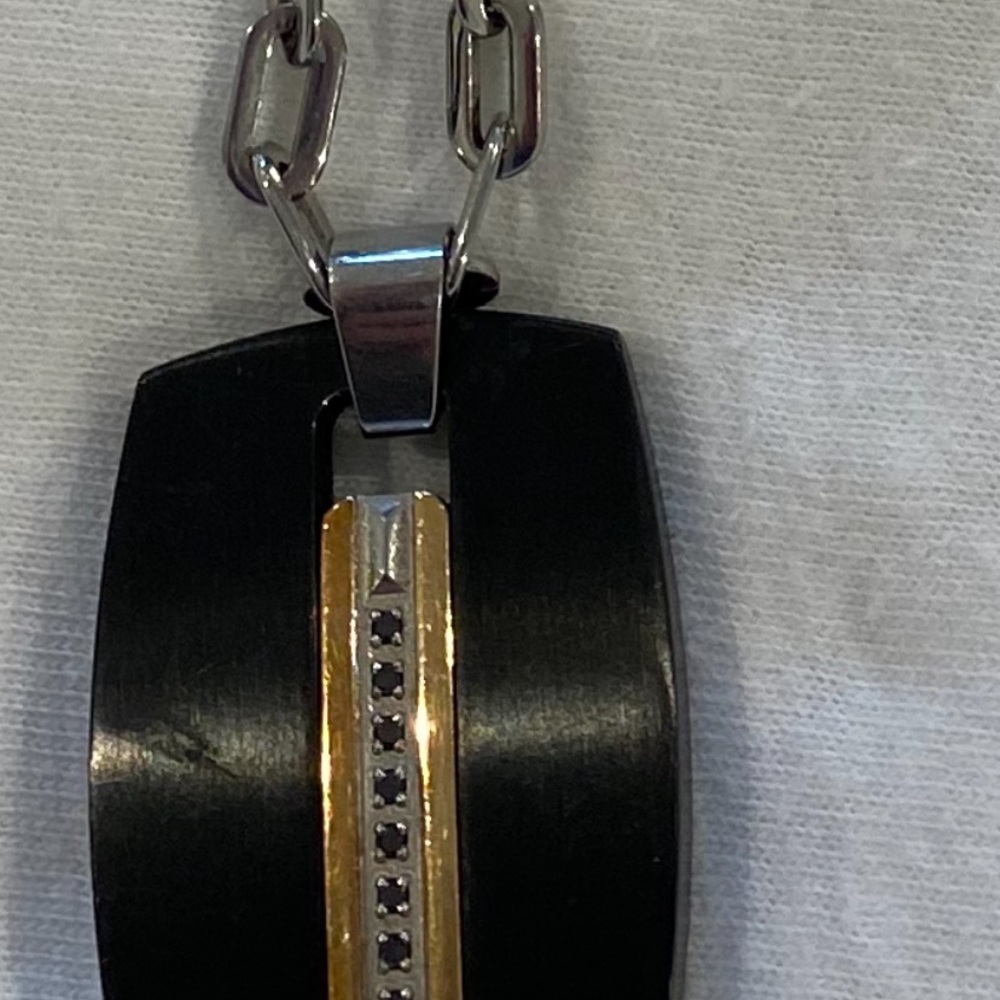 Triton Dog tag necklace with black stones.